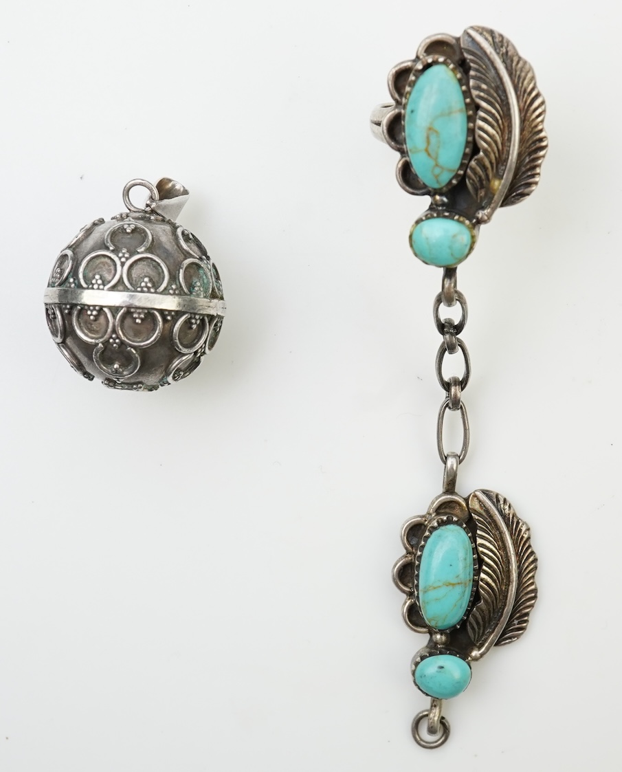 A collection of silver jewellery including a Zuni bangle